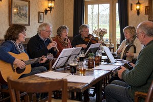 Illustratief sfeerbeeld van een Ierse muzieksessie
